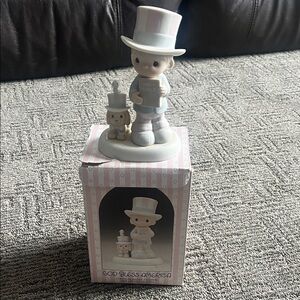 Precious Moments Figurine with Pink and White Accents